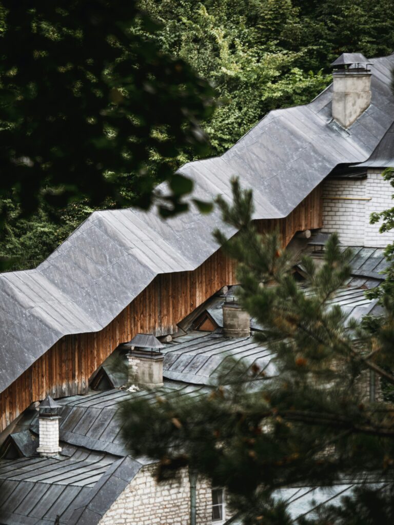 a view of a building with a wooden roof