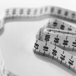 selective focus photography of tape measure